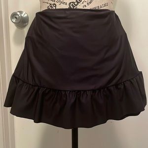 Black J.Crew swim skirt with ruffle hem. Like new. SZ XS- smoke free home